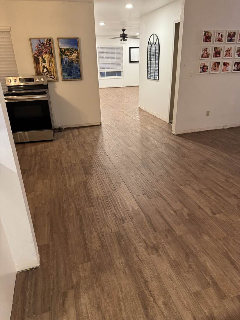 Finished wood-look tile flooring in an open living space